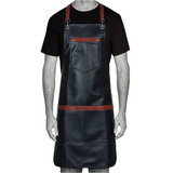 Person wearing a black leather apron with brown accents on a white background