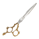 A pair of professional hairdressing scissors with a polished silver finish, featuring convex edge blades and a fixed finger rest.