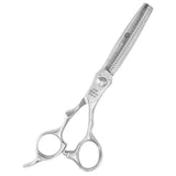 A pair of professional thinning scissors with a silver damascus pattern.