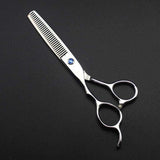 Left-handed professional thinning scissors with a polished finish, featuring beveled edge blades and a fixed finger rest.
