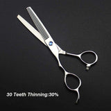 Left-handed professional thinning scissors with a polished finish, featuring beveled edge blades and a fixed finger rest.