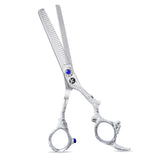 A pair of professional thinning scissors with beveled edge blades, polished finish, and an adjustable finger rest.