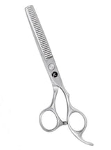 A pair of silver professional thinning scissors with beveled edge blades and a fixed finger rest.