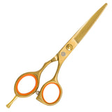 A pair of golden 5.5 hairdressing scissors with convex edge blades and a fixed finger rest.