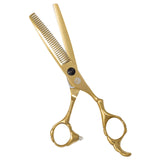 A pair of golden hair thinning scissors with a fixed finger rest and beveled edge blades.
