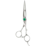 A pair of silver-colored hairdressing scissors with a green crystal on the handle, designed for professional use.
