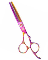 A pair of professional multicolor thinning scissors with a dragon design on the handle.