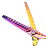 A pair of professional multicolor thinning scissors with a dragon design on the handle.
