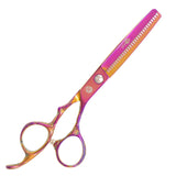 A pair of professional multicolor thinning scissors with a dragon design on the handle.