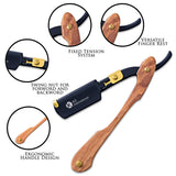 A wooden handle straight black razor with a curved blade, featuring a black and gold color scheme and a branded strap.