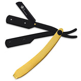 A straight razor with a gold handle and a black-colored head.