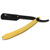 A straight razor with a gold handle and a black-colored head.